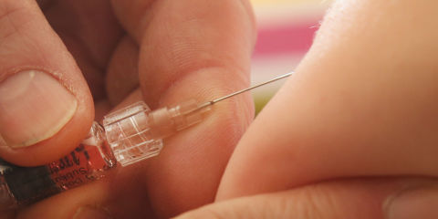 administering a vaccine